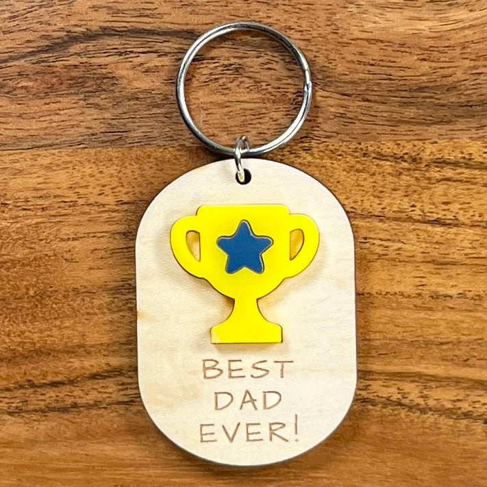 Best Dad Ever laser-cut maple wood keychain with yellow acrylic trophy and blue star detail