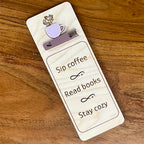 Sip Coffee Read Books Stay Cozy birch wood bookmark with ash rose acrylic coffee cup on mauve book