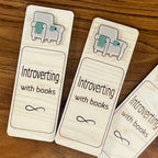Introverting with Books birch wood bookmark with sage acrylic cozy chair and mug