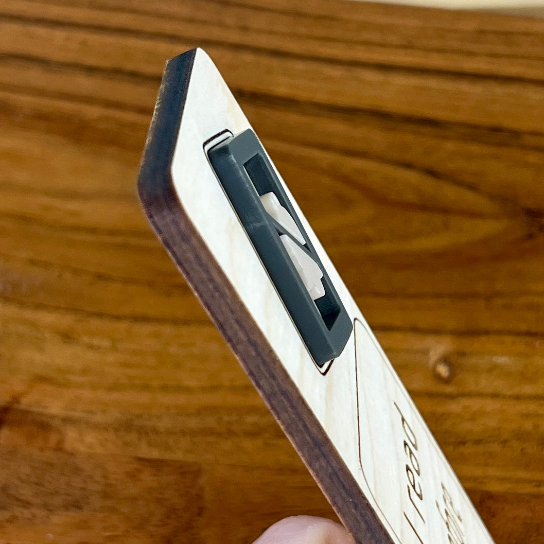 Side view of I Read Therefore I Ignore People birch bookmark showing dimensional acrylic layers
