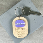 Drive Safe laser-engraved maple keychain with purple macaron accent and silver key ring