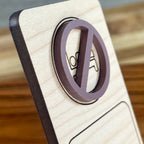 Side view of I Read Past My Bedtime birch bookmark showing dimensional mauve acrylic layer