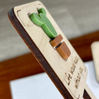 Side view of Life Would Succ Without You plant stake showing layered maple wood and green acrylic depth