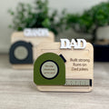 Personalized wood and acrylic tape measure magnet - group view showing multiple colour options