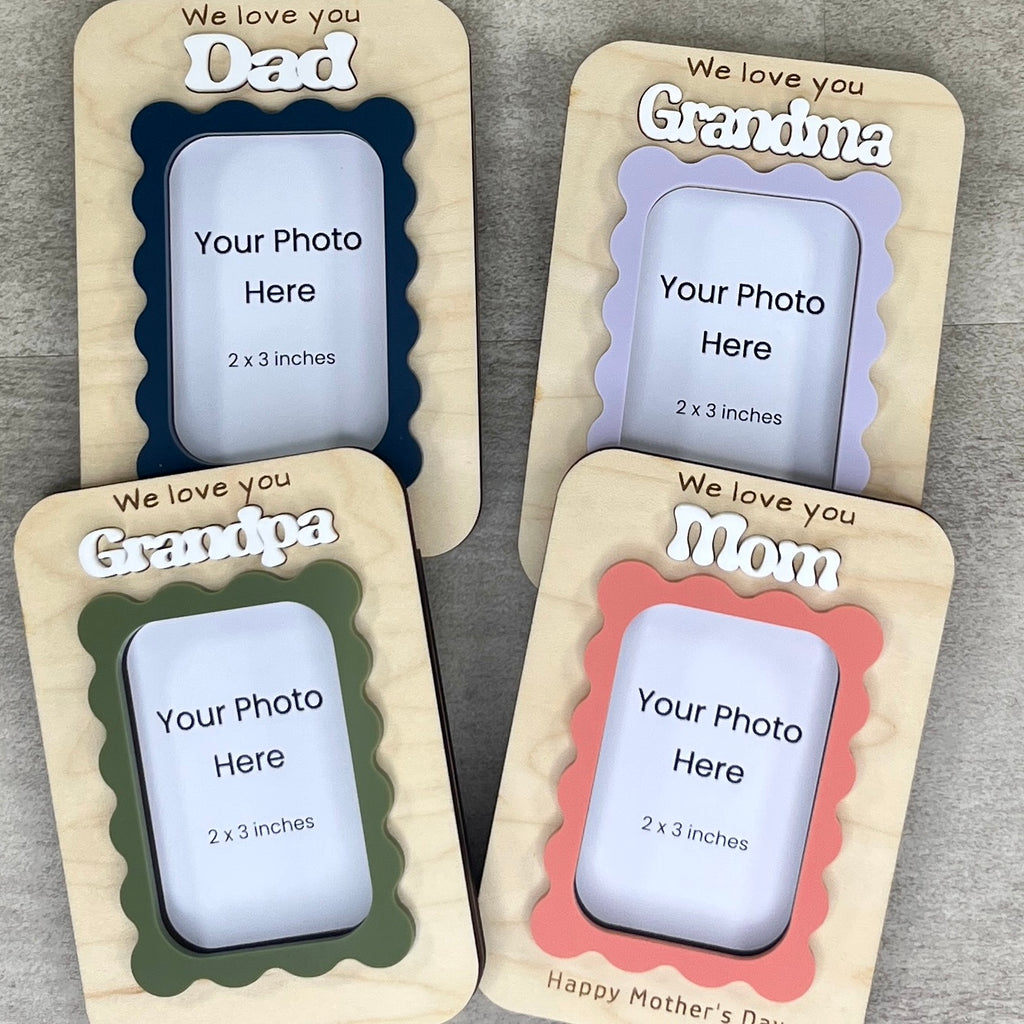 Personalized wavy frame magnets flat lay showing multiple acrylic colour options with photo inserts