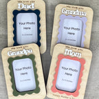 Personalized wavy frame magnets flat lay showing multiple acrylic colour options with photo inserts