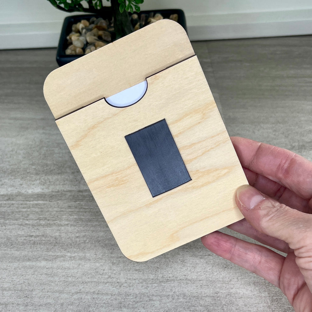 Rear view of personalized maple and acrylic magnetic picture frame showing magnet backing