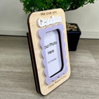 Side view of personalized wavy frame magnet showing layered maple and acrylic construction