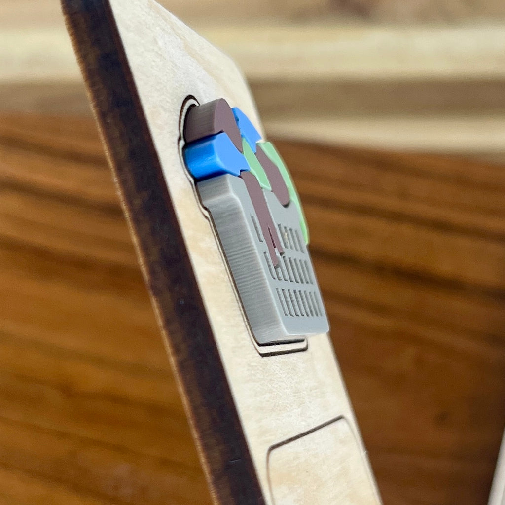 Side view of Current Status Ignoring Responsibilities birch bookmark showing dimensional acrylic layers